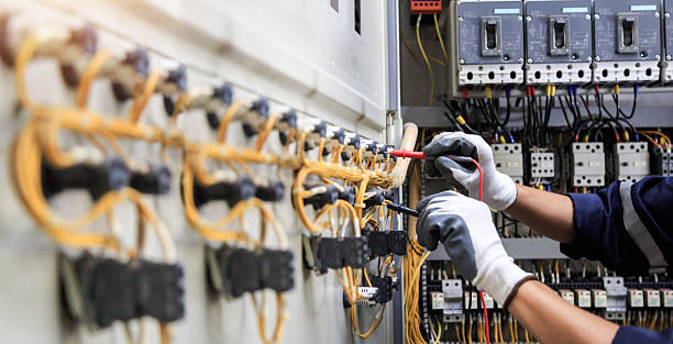 Professional Electrician technician working in Madison, GA